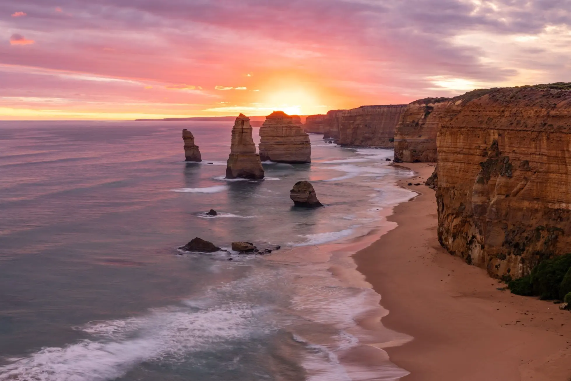 Twelve Apostles limestone stacks at sunset